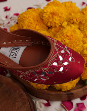 Deep red khussa flats with mirror-style embellishments