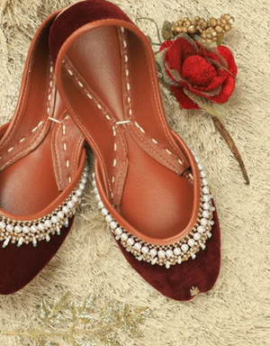 Maroon Punjabi jutti for women with pearl embellishments