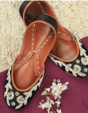 Black Punjabi jutti for women with pearl embellishments