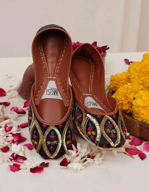Black gold paisley khussa flats with colorful thread accents